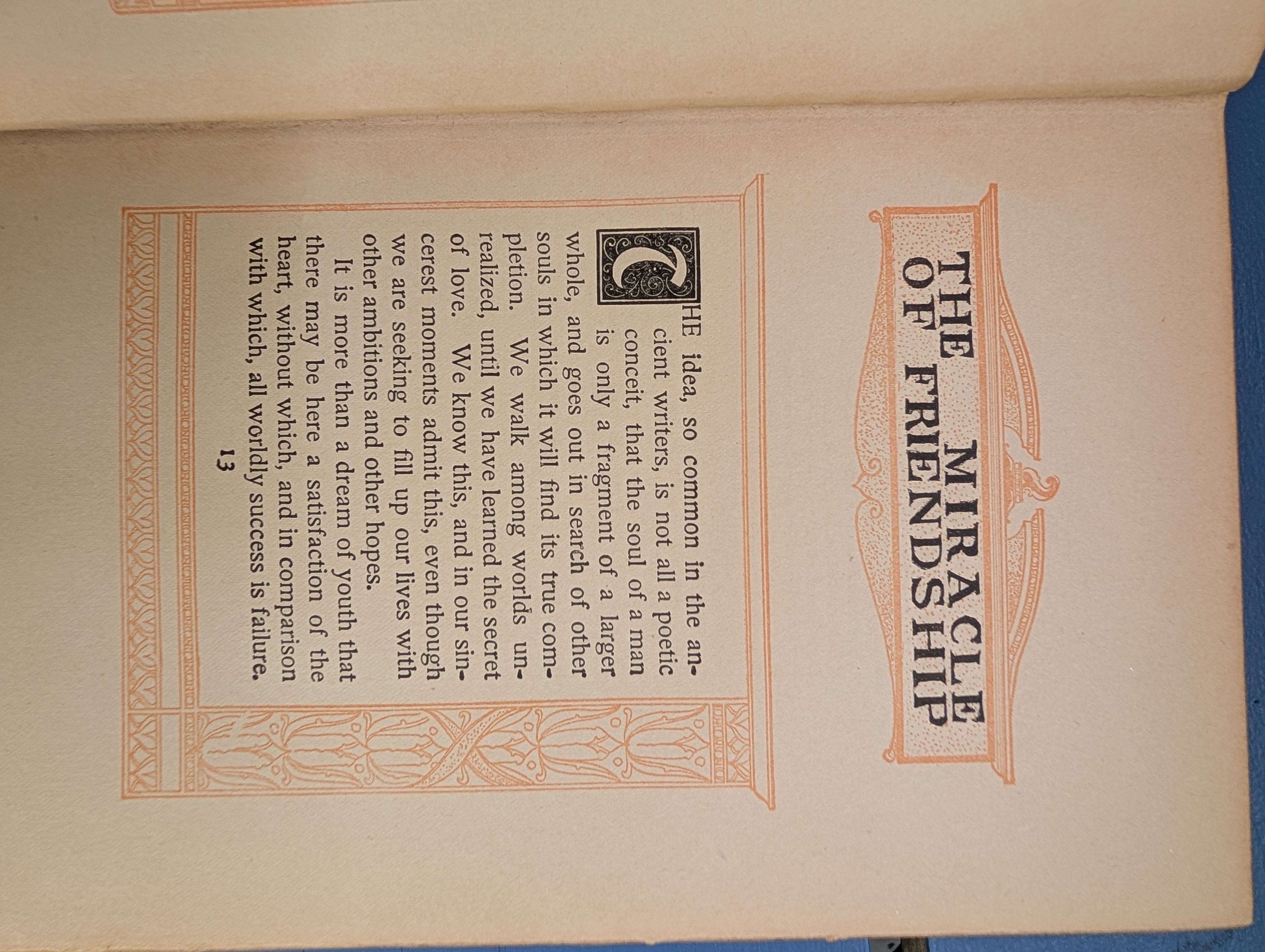 First page of Friendship by Hugh Black with the first chapter title and text block surrounded by an ornate orange border
